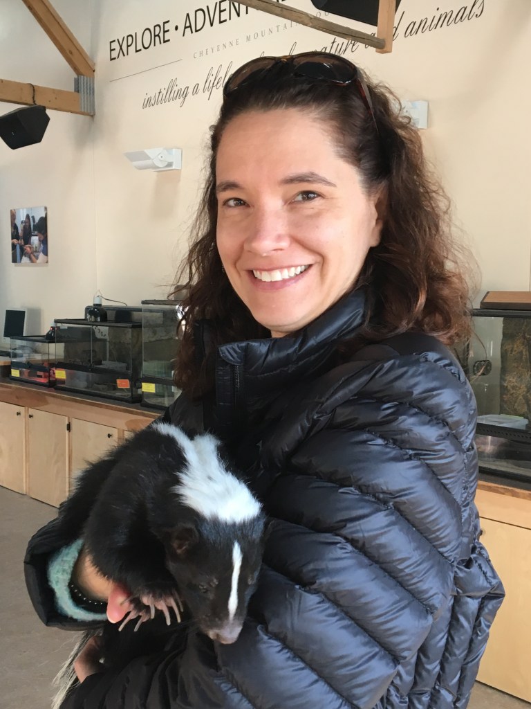 Amy meeting a skunk.